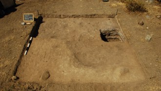 A photo of an excavated section of a platform at a pre-Inca site in Peru.