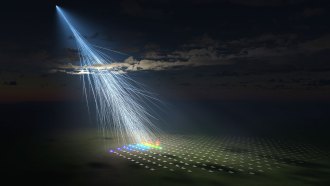 An illustration of a shower of particles in Earth's atmosphere produced by a cosmic ray. Detectors on the ground spot the particles in the shower.