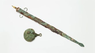 Sword and bronze mirror from a 2,000-year-old grave in England